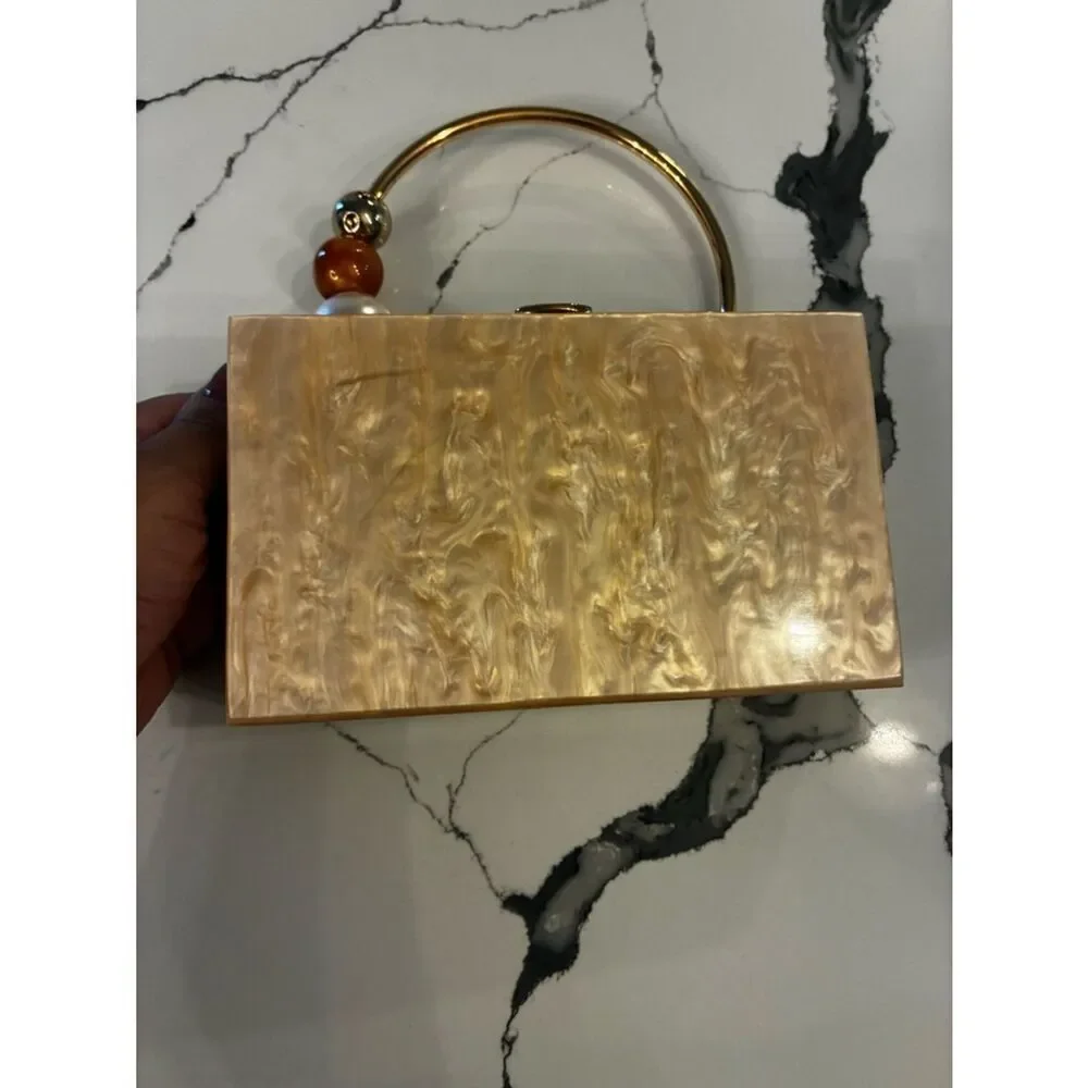 Lulu's Pearlescent Pink Acrylic Box Clutch with Gold Ring Handle